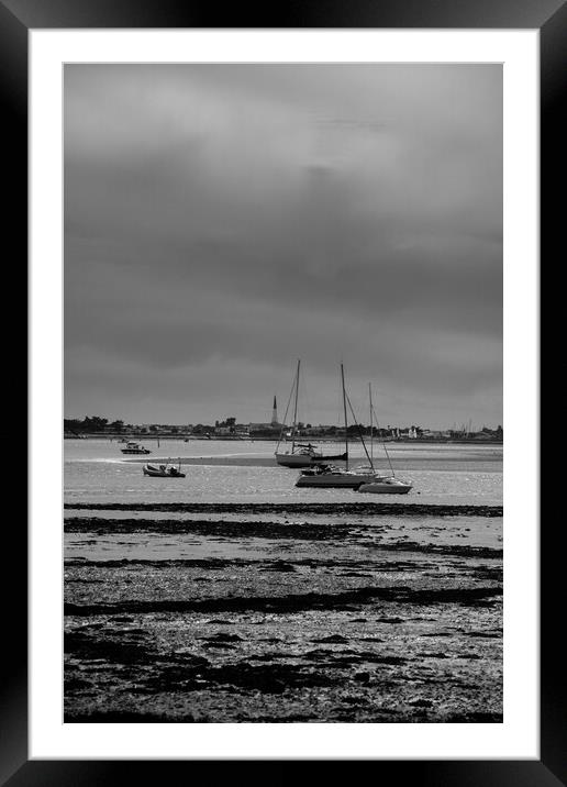 pleasure boats at lowtide in black and white Framed Mounted Print by youri Mahieu