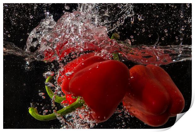 pepper splashing about Print by kathy white