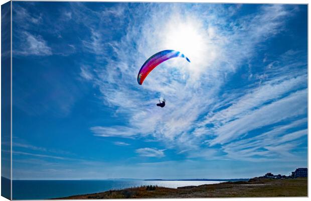 Paraglider in the Sun Canvas Print by Joyce Storey