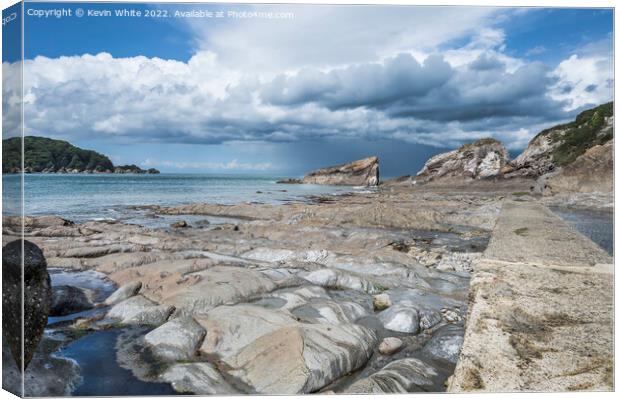 Storm clouds over Coombe Martin bay Canvas Print by Kevin White