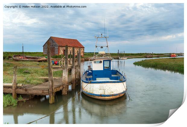 A fishing boat moored at a wodden jetty at Thornham Print by Helen Hotson