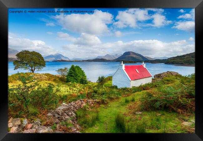 A pretty red roofed croft on the Applecross Peninsula Framed Print by Helen Hotson