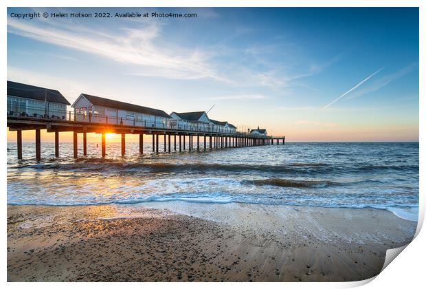 Beautiful sunrise over the pier at Southwold Print by Helen Hotson