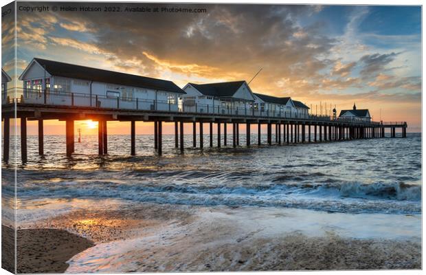 Sunrise over the pier at Southwold, Canvas Print by Helen Hotson