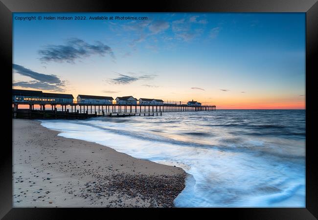 Dawn at the pier at Southwold  Framed Print by Helen Hotson