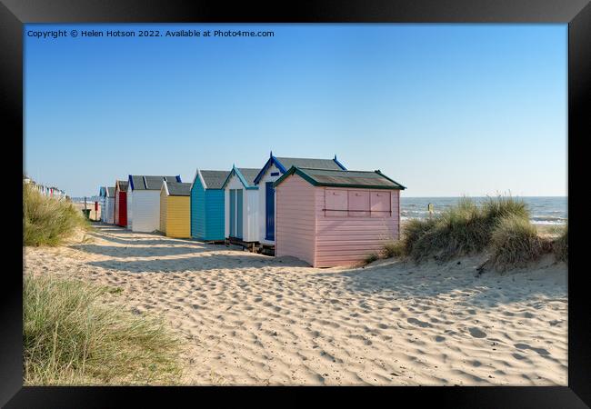 Beach Huts at Southwold Framed Print by Helen Hotson