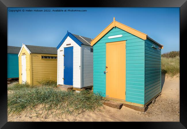 Beach Huts at Southwold Framed Print by Helen Hotson