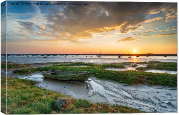 An old boat in the salt marsh at West Mersea  Canvas Print by Helen Hotson