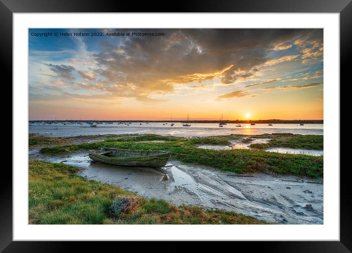 An old boat in the salt marsh at West Mersea  Framed Mounted Print by Helen Hotson
