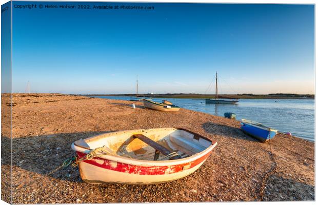 Boats on the beach at West Mersea Canvas Print by Helen Hotson