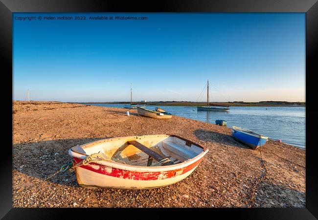 Boats on the beach at West Mersea Framed Print by Helen Hotson