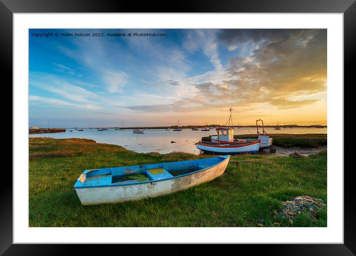 Beautiful sunset over old fishing boats in Suffolk Framed Mounted Print by Helen Hotson