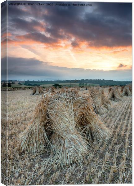 Barley Stooks Canvas Print by Helen Hotson