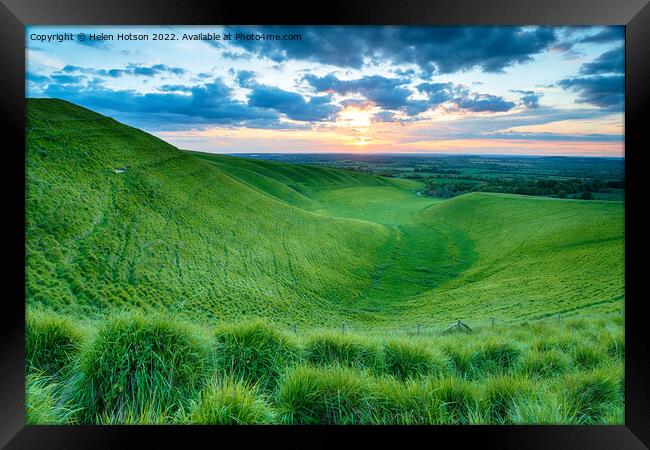 Dramatic sunset over The Manger at Uffington Framed Print by Helen Hotson