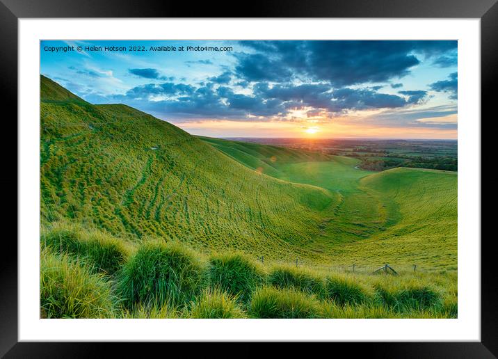 Dramatic sunset over The Manger in Uffington Framed Mounted Print by Helen Hotson