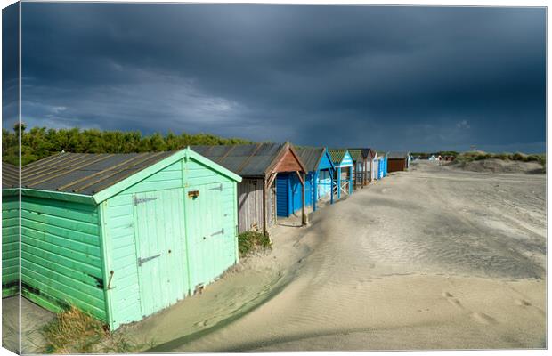 Storm Clouds at West Wittering Canvas Print by Helen Hotson
