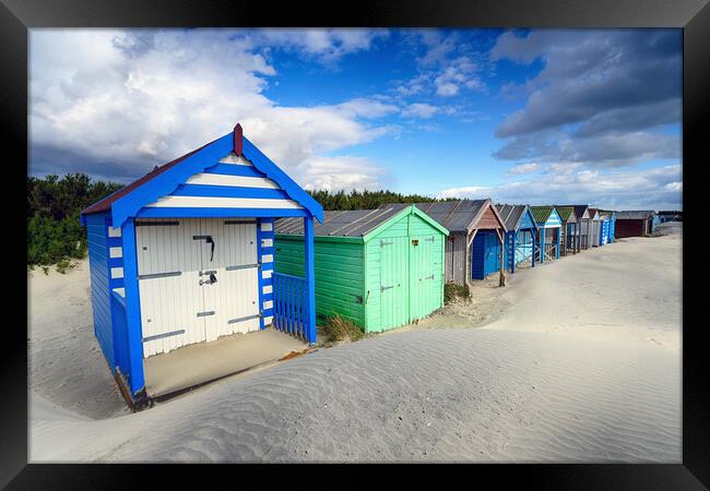 Colourful Beach Huts Framed Print by Helen Hotson