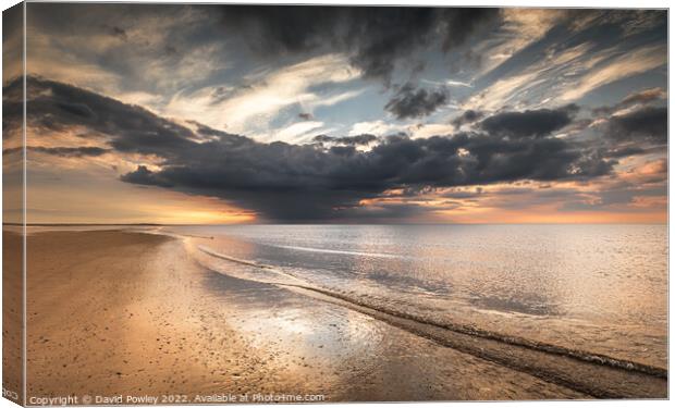 Storm Clouds Reflect on Brancaster Beach Canvas Print by David Powley