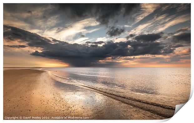 Storm Clouds Reflect on Brancaster Beach Print by David Powley