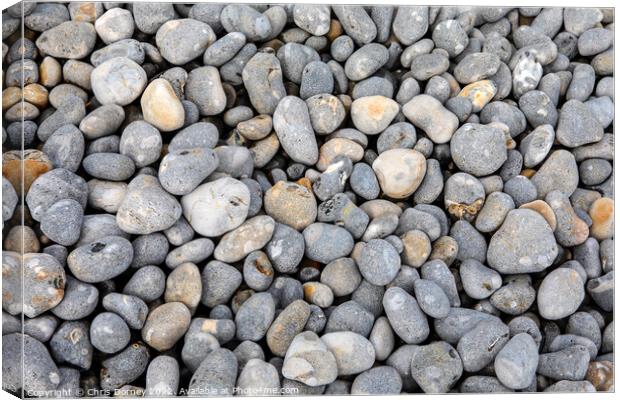 Close-up of Pebbles Canvas Print by Chris Dorney