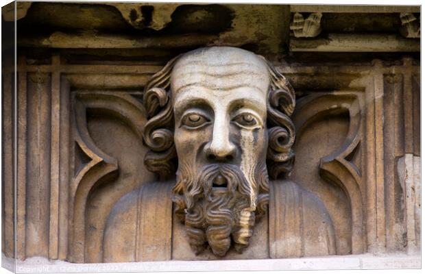 Sculpture on the Exterior of York Minster in York, UK Canvas Print by Chris Dorney