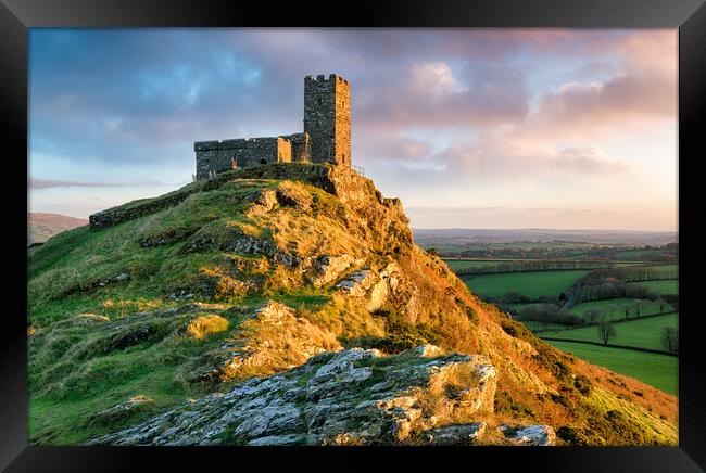 Dramatic Skies over Brentor Chapel Framed Print by Helen Hotson