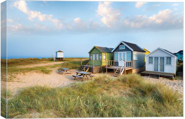 Mudeford Spit Beach Huts Canvas Print by Helen Hotson