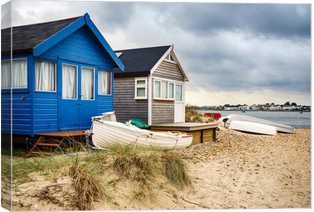 Beach Huts and Boats Canvas Print by Helen Hotson