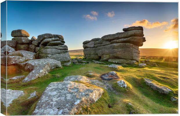 Beautiful sunset over granite rock formations at Combestone Tor  Canvas Print by Helen Hotson