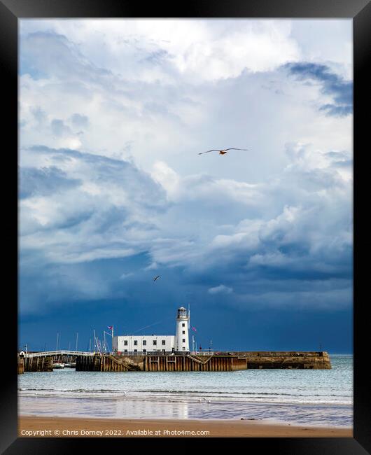 Scarborough Pier Lighthouse in Scarborough, Yorkshire, UK Framed Print by Chris Dorney