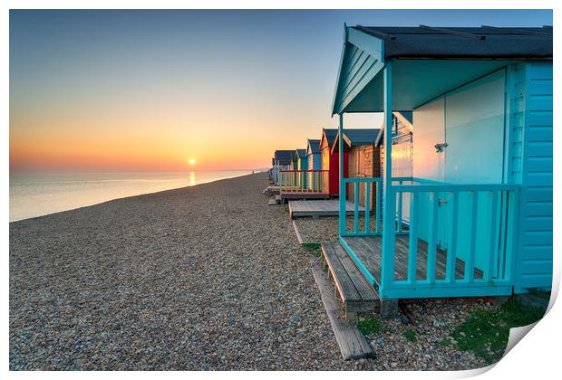 Stunning sunset over seaside beach huts  Print by Helen Hotson