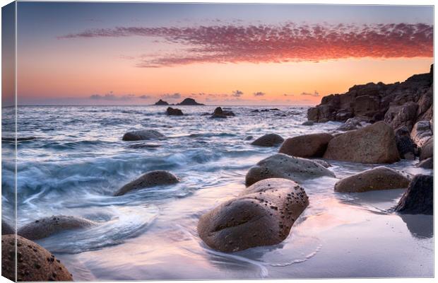 Sunset at Porth Nanven Cove in Cornwall Canvas Print by Helen Hotson