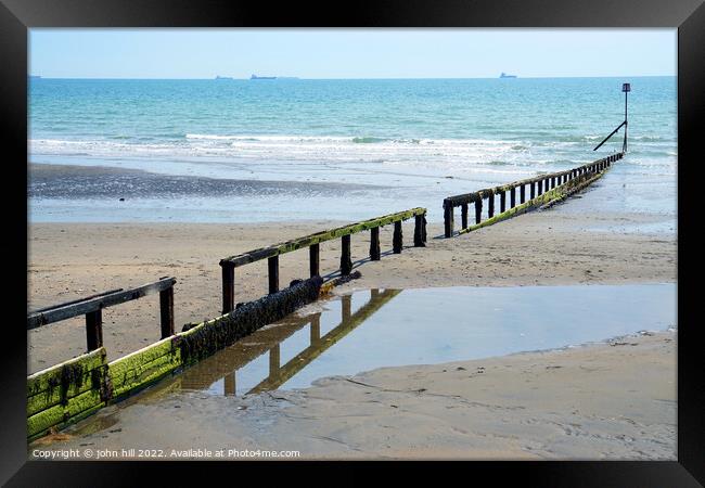 Single Groyne and Marker at Low tide. Framed Print by john hill