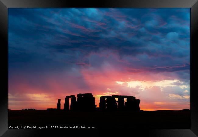 Stonehenge at sunset, dramatic sky Framed Print by Delphimages Art