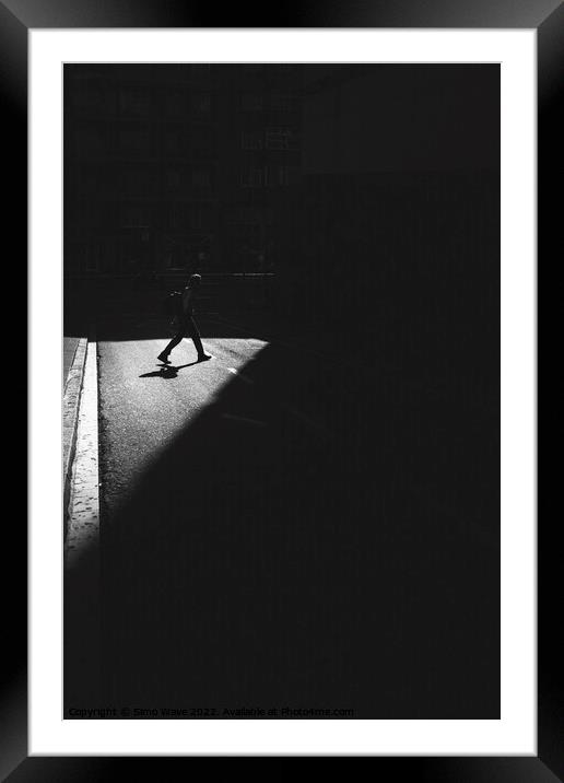 Man walking in the city Framed Mounted Print by Simo Wave