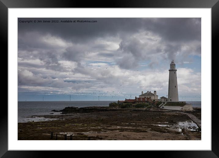 St Mary's Island under a stormy sky Framed Mounted Print by Jim Jones