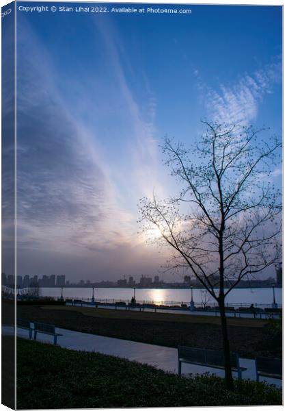 Sunset over Huangpu river Canvas Print by Stan Lihai