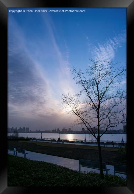 Sunset over Huangpu river Framed Print by Stan Lihai