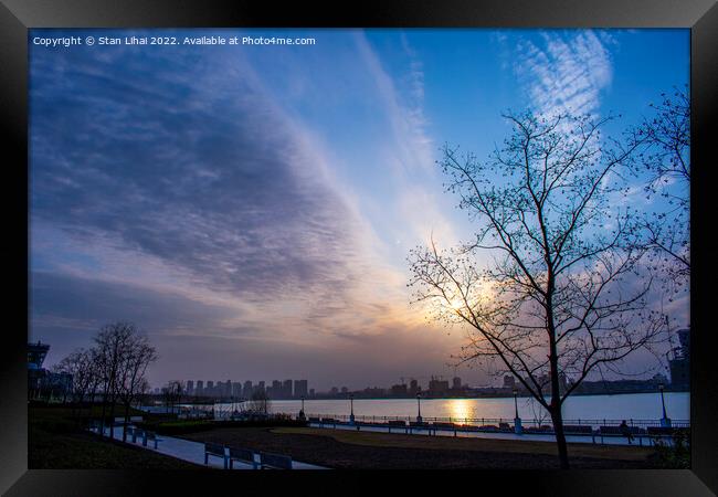 Sunset over Huangpu river  Framed Print by Stan Lihai
