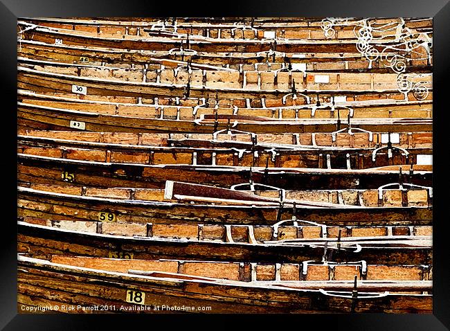 Old Wooden Rowing Boats Moored Framed Print by Rick Parrott