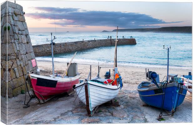 Fishing boats on the beach at Sennen Cove Canvas Print by Helen Hotson
