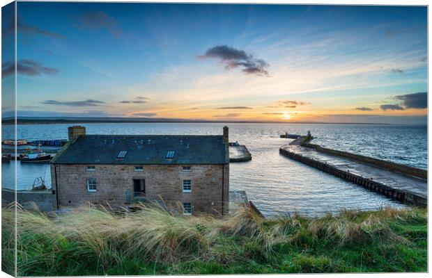 Sunset over the harbour at Burghead Canvas Print by Helen Hotson
