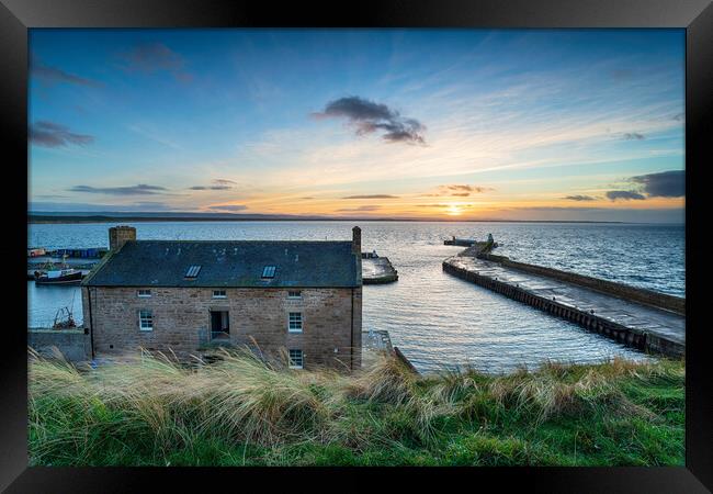 Sunset over the harbour at Burghead Framed Print by Helen Hotson