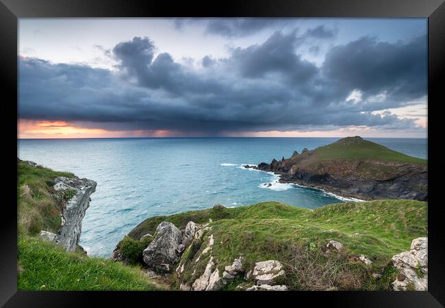 Rain Clouds over the Cornish Coast Framed Print by Helen Hotson
