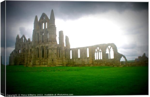 Whitby Abbey ruins on a cloudy day Canvas Print by Fiona Williams