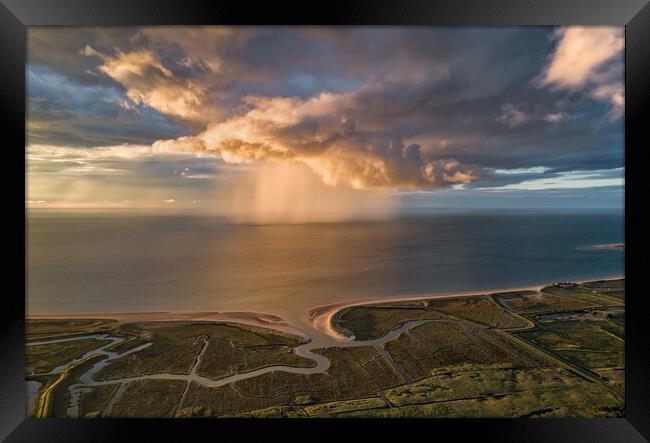 A sunset rain shower out at sea  Framed Print by Gary Pearson