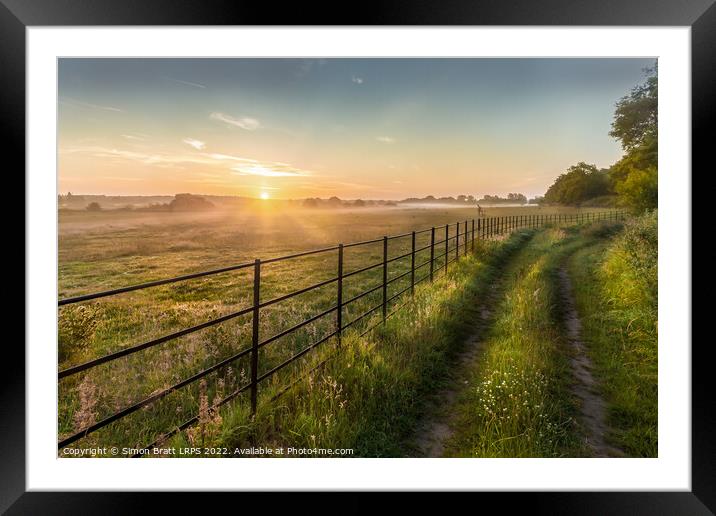 Castle Rising Norfolk sunrise over rural fields fe Framed Mounted Print by Simon Bratt LRPS