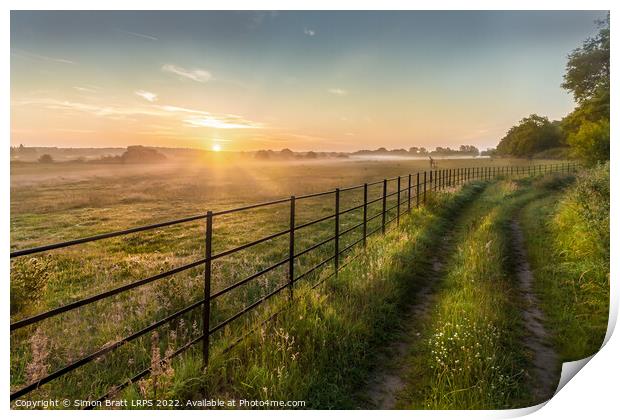 Castle Rising Norfolk sunrise over rural fields fe Print by Simon Bratt LRPS