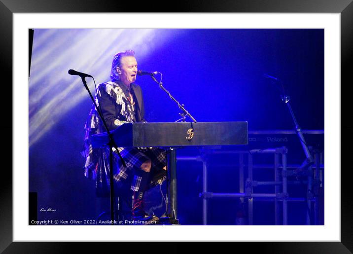 Enchanting Melodies: Larry Gowan and the Captivati Framed Mounted Print by Ken Oliver