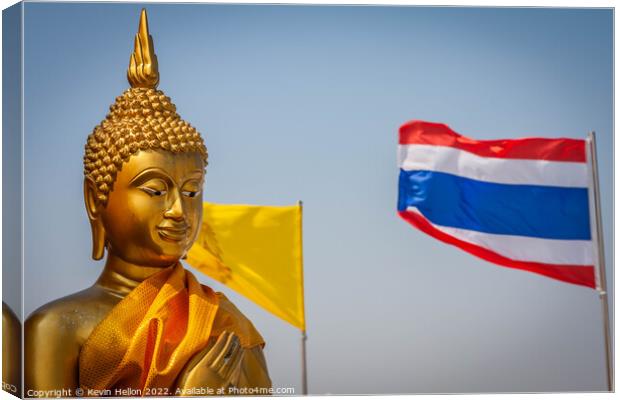 Buddha statue and Thai flag,  Canvas Print by Kevin Hellon